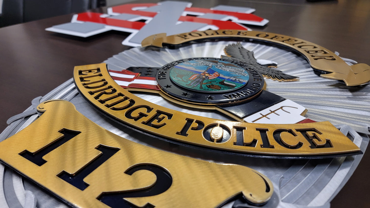 North Scott Sign And Eldridge Police Badge